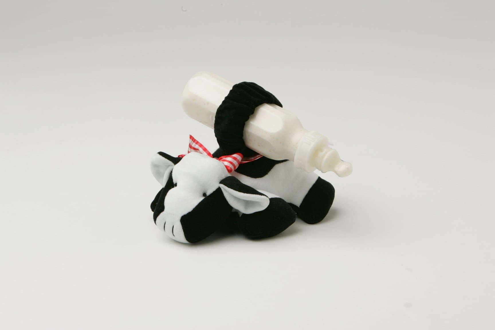 Bottle Snugglers Feeding Time Helpers - Cuddly Cow