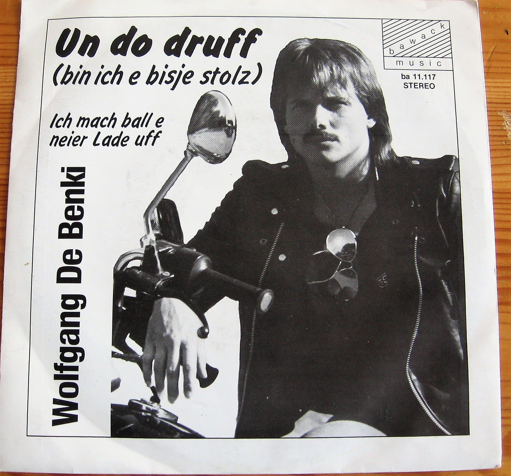 Wolfgang De Benki / Un do druff (bin ich e bisje stolz) / Ich mach ball e neier Lade uff / 1983 / Bildhülle / bawack music # ba 11.117 / Deutsche Pressung / 7" Vinyl Single Schallplatte