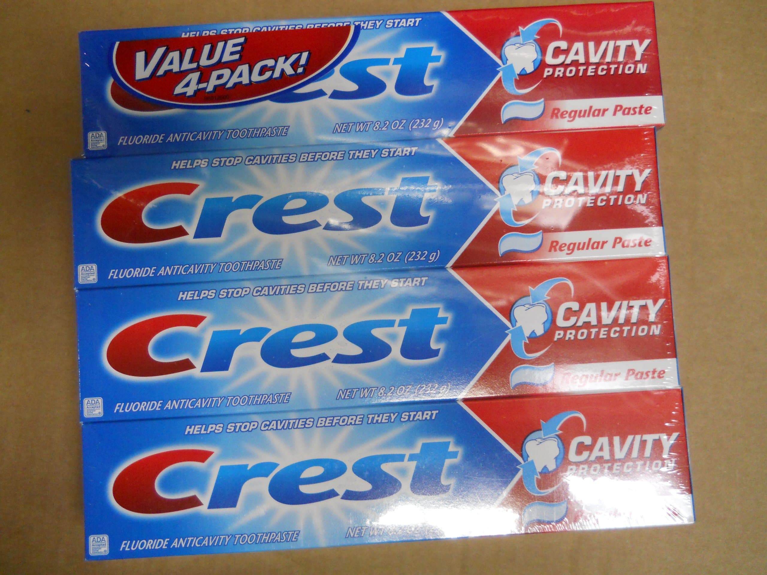 Crest, fluoride anticavity toothpaste, cavity protection, regular flavor, Net Wt 8.2 oz. - Pack of 4