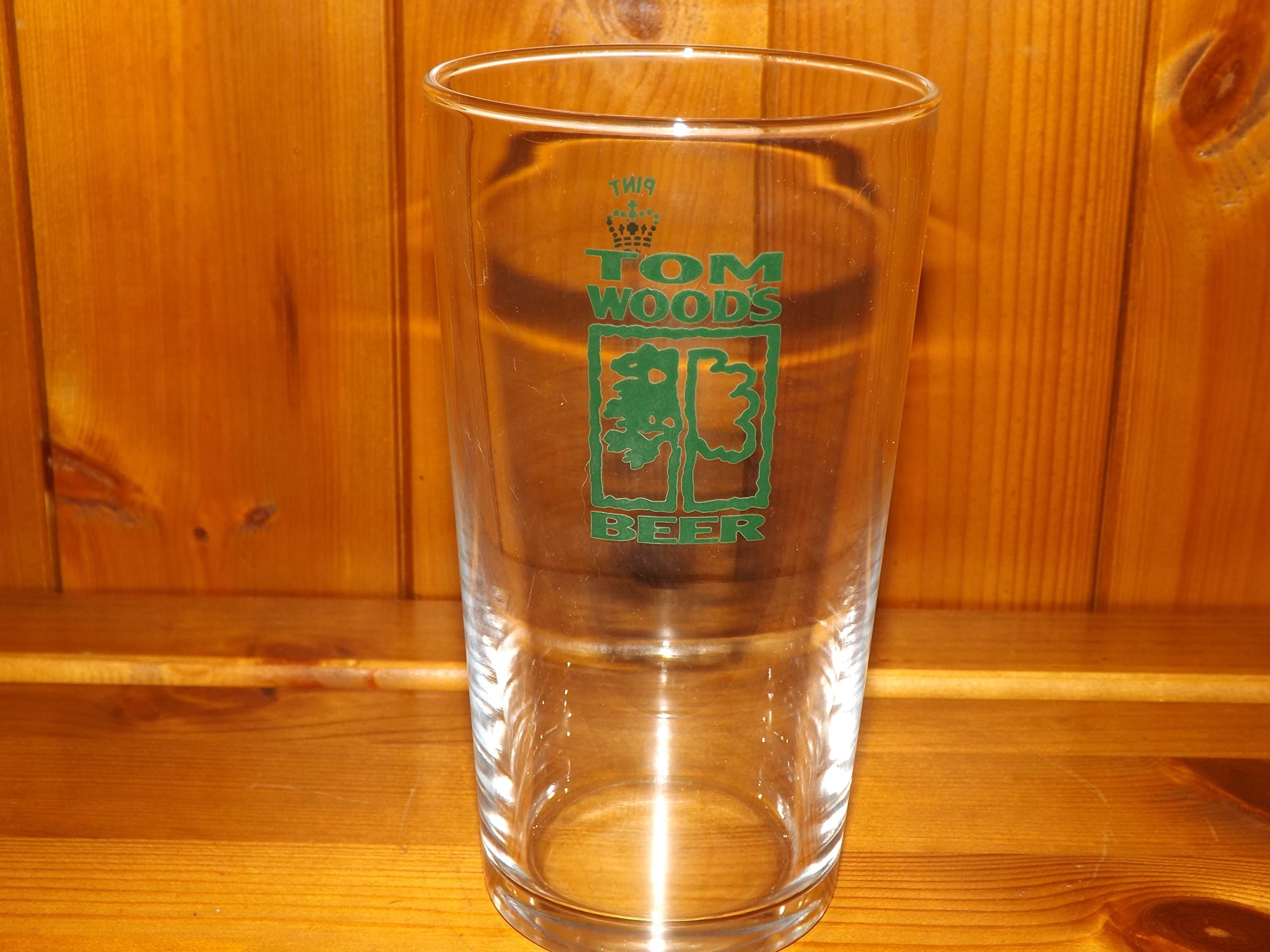TOM WOODS BEER PINT GLASS